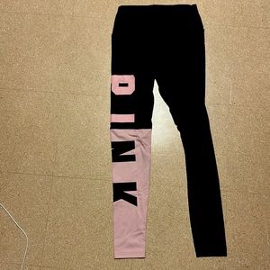 PINK workout leggings. size small. mid rise waist band. Colors :black and pink.